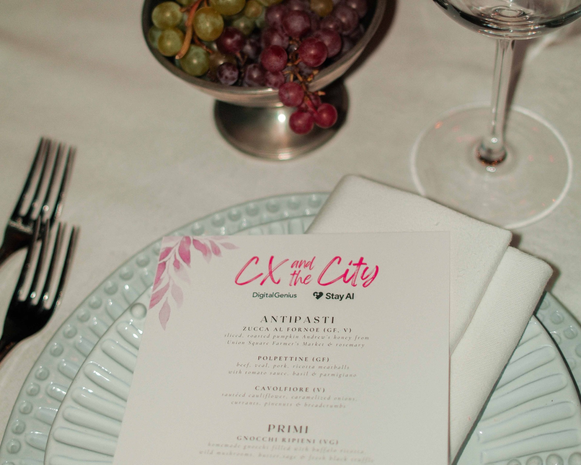 Place setting with menu card at a CX and the City dinner